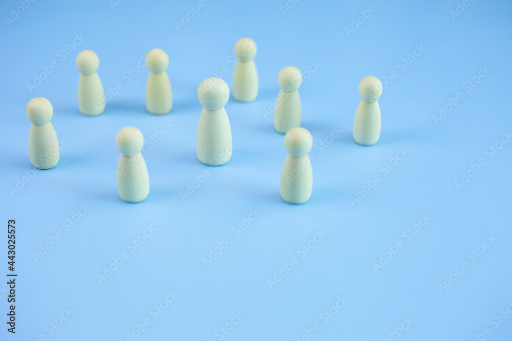 Wood person symbol icon standing on pastel blue background, copy space. Wood person symbol icon standing on pastel blue background, copy space.