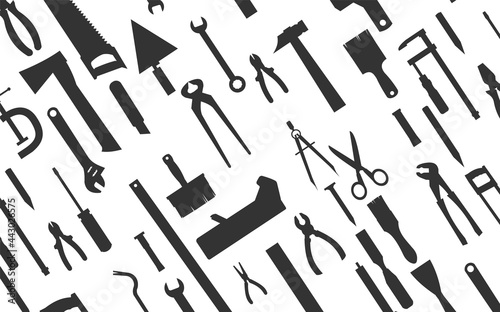 Construction tools. Background. For work as a painter, carpenter, builder, handyman. Repair and construction services. Sale of tools. Monochrome silhouette.