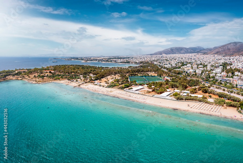 Fototapeta Naklejka Na Ścianę i Meble -  Aerial view of the beautiful coast of Voula, southern Athens, Greece, with the first public beach and turquoise sea