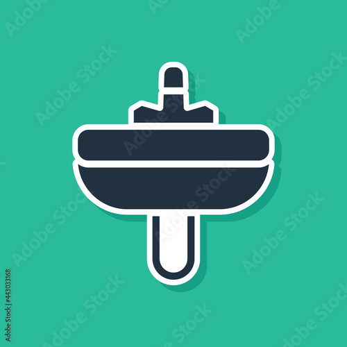 Blue Washbasin with water tap icon isolated on green background. Vector