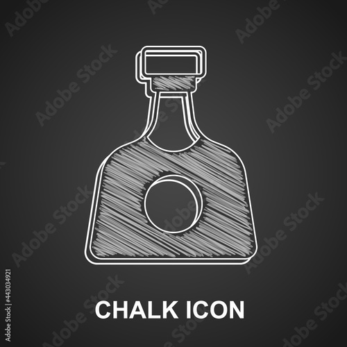 Chalk Tequila bottle icon isolated on black background. Mexican alcohol drink. Vector