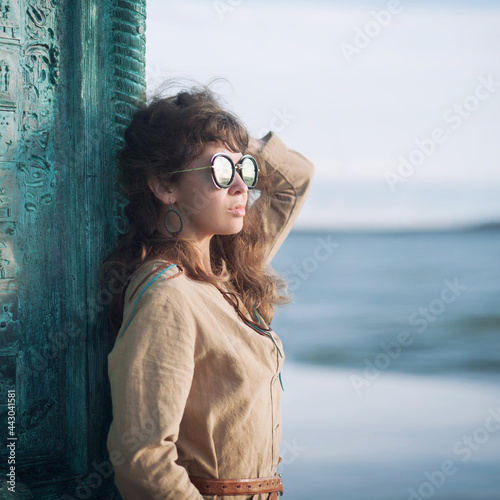Young woman outdoor portrait near the sea