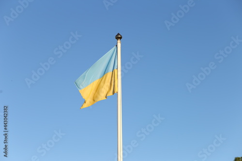 Flag of Ukraine against sky