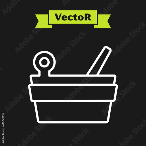 White line Sauna bucket and ladle icon isolated on black background. Vector