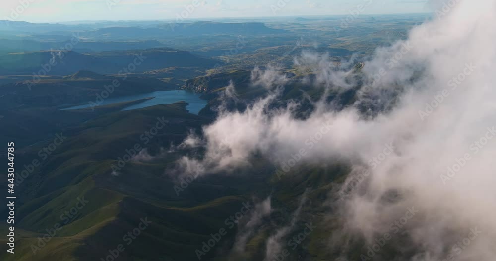 Aerial view of clouds drifting in the spectacular Drakensberg mountains, KwaZulu-Natal,South Africa Aerial view of clouds drifting in the spectacular Drakensberg mountains, KwaZulu-Natal,South Africa