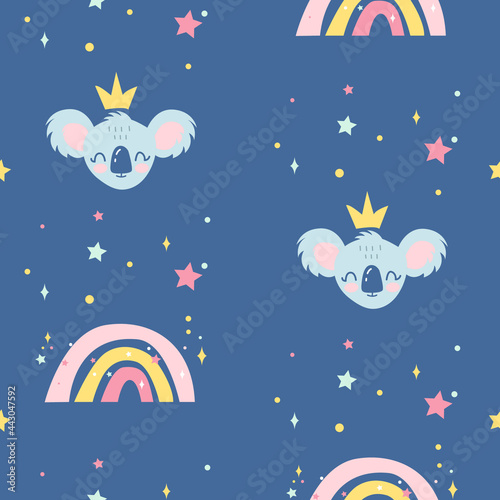 Vector seamless childish pattern with a   ute baby koala with a crown on its head and a rainbow isolated on a dark blue background. 