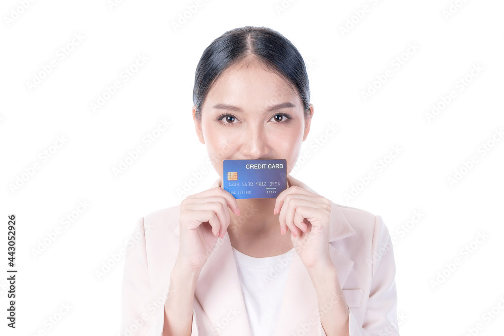 Business Asian woman showing credit card for payment shopping online , paying by credit card online shopping e-commerce telemarketing concept Business Asian woman showing credit card for payment shopping online , paying by credit card online shopping e-commerce telemarketing concept