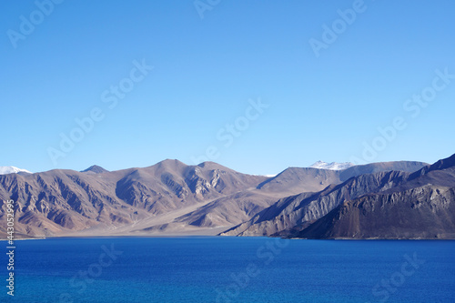 Landscape Nature Scene of Pangong tso or Pangong Lake with himalaya snow mountain background is best famous destination at Leh Ladakh ,Jammu and Kashmir , India 
