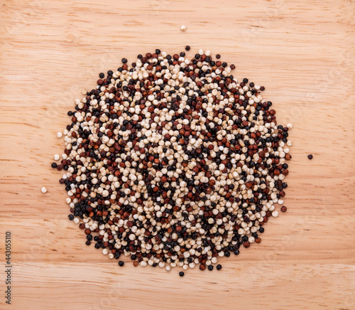 Quinoa seeds on a wooden background
