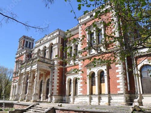An ancient building. Manor house of a noble estate made of red bricks with white trim. The main house of the Bykovo estate. 