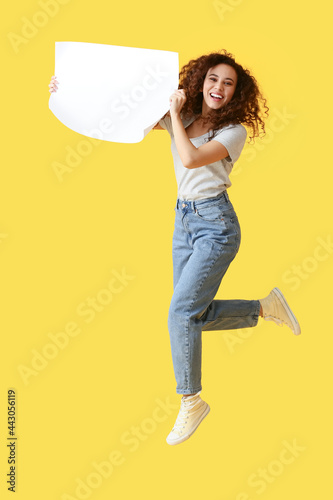 Jumping young woman with bl...