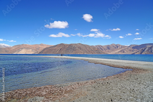 Landscape Nature Scene of Pangong tso or Pangong blue Lake with Himalaya Snow mountain background at Leh Ladakh  Jammu and Kashmir   India  - unseen travel vacation park and outdoor