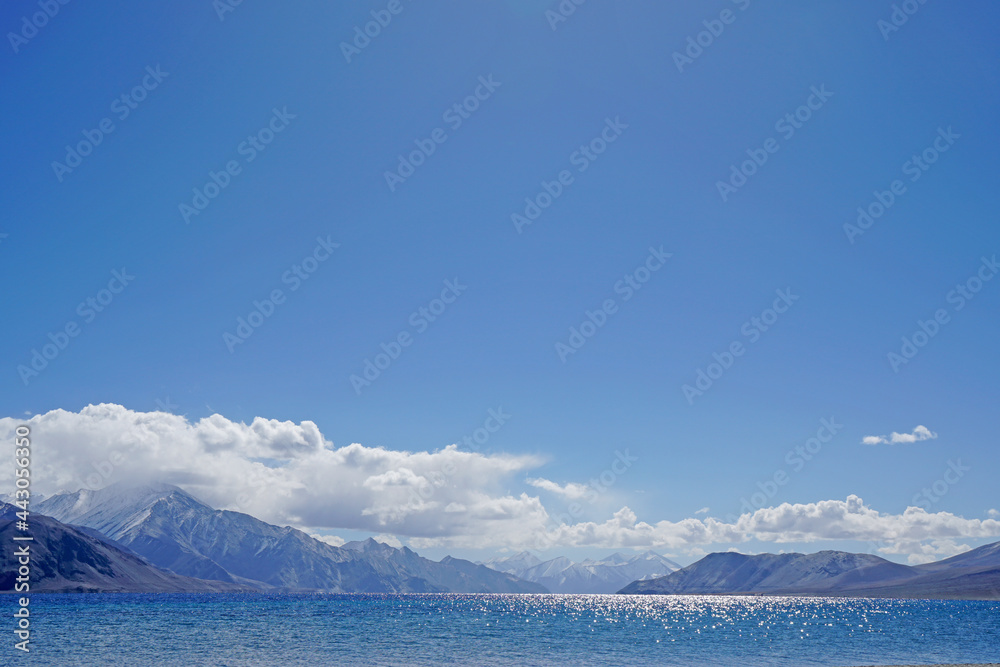 Landscape Nature Scene of Pangong tso or Pangong blue Lake with Himalaya Snow mountain background at Leh Ladakh ,Jammu and Kashmir , India - unseen travel vacation park and outdoor Landscape Nature Scene of Pangong tso or Pangong blue Lake with Himalaya Snow mountain background at Leh Ladakh ,Jammu and Kashmir , India - unseen travel vacation park and outdoor