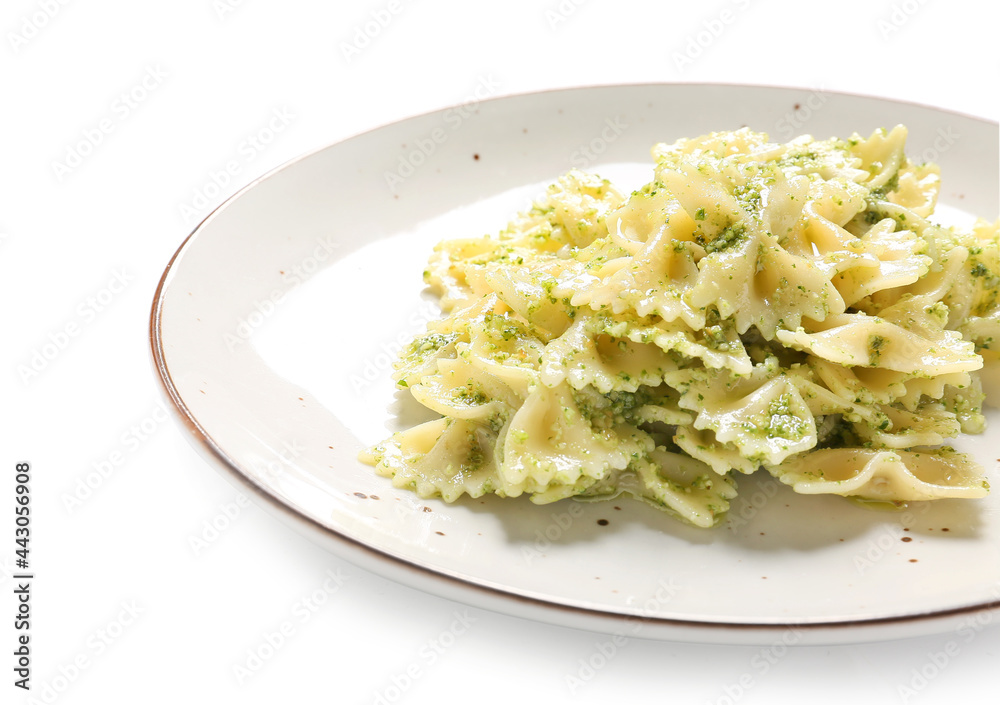 Plate with tasty pesto pasta on white background Plate with tasty pesto pasta on white background