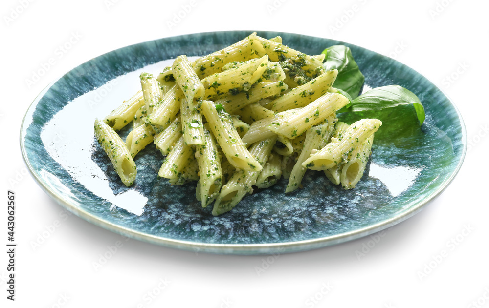 Plate with tasty pesto pasta on white background