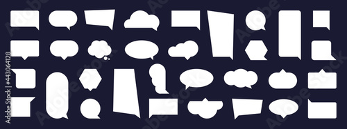 White speech bubble cloud signs collection. Blank message bubbles icons. Isolated white abstract shapes on dark, flat design set. Vector illustration on dark background.