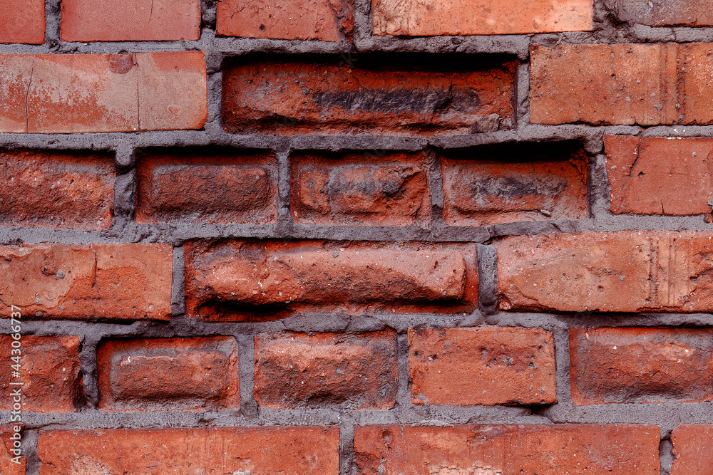 Empty Old red Brick Wall Texture. Painted Distressed Wall Surface. Grungy Wide Brickwall. Grunge Red Stonewall Background. Shabby Building Facade With Damaged Plaster. Abstract Web Banner. Copy Space. Empty Old red Brick Wall Texture. Painted Distressed Wall Surface. Grungy Wide Brickwall. Grunge Red Stonewall Background. Shabby Building Facade With Damaged Plaster. Abstract Web Banner. Copy Space.