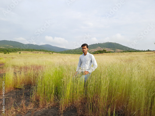 person on a meadow  young man in the wild  people in field. 