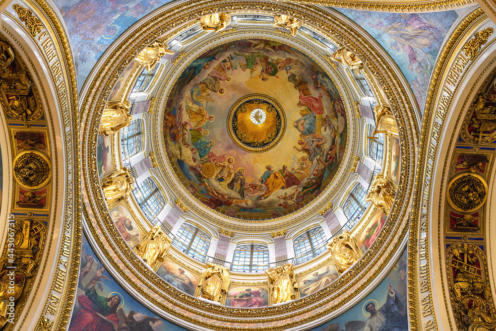 St. Isaac's Cathedral in St. Petersburg (Russia) in detail. The plafond of the main dome. The beauty of the interior design of the cathedral, especially the painting of the vault. 