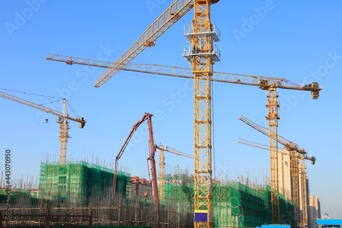 the construction worker's tower crane, Residential buildings are under construction