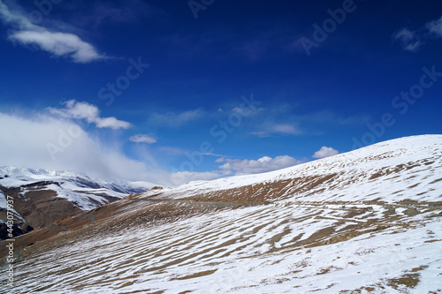 Landscape Natural Scene white Snow on the   himalaya snow mountain of High Roadway at tanglang la pass in winter season at Leh Ladakh , India photo