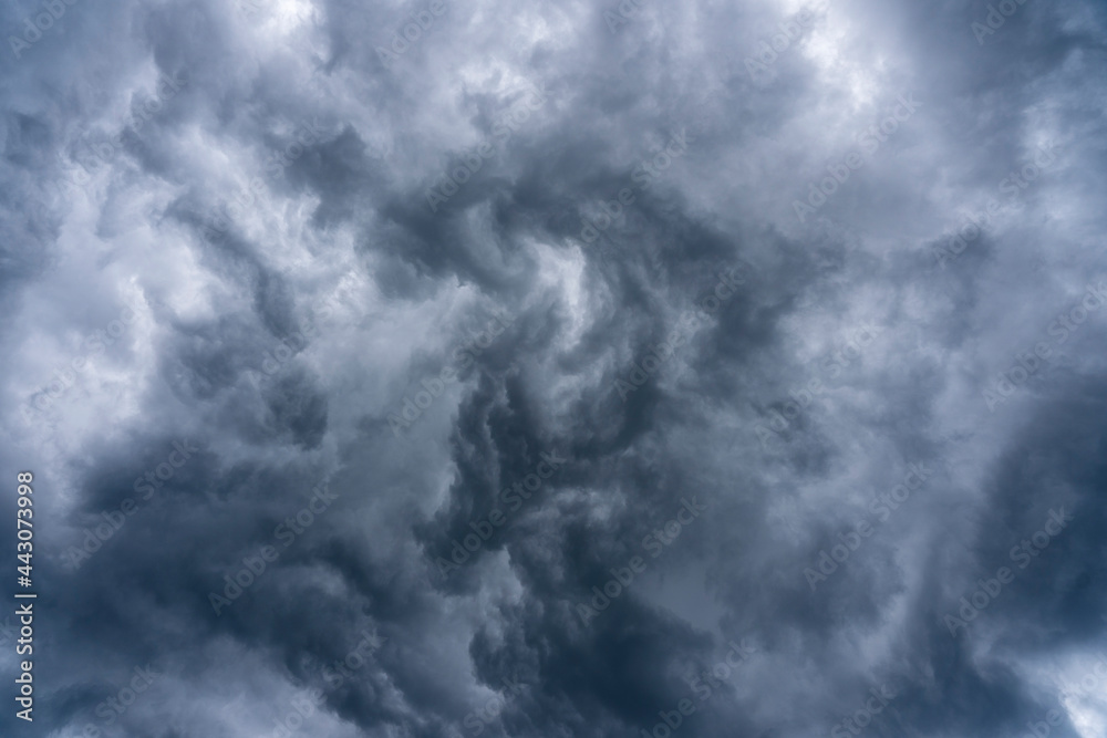 Dramatic stormy sky with beautiful cloud at sundown before the rain Dramatic stormy sky with beautiful cloud at sundown before the rain