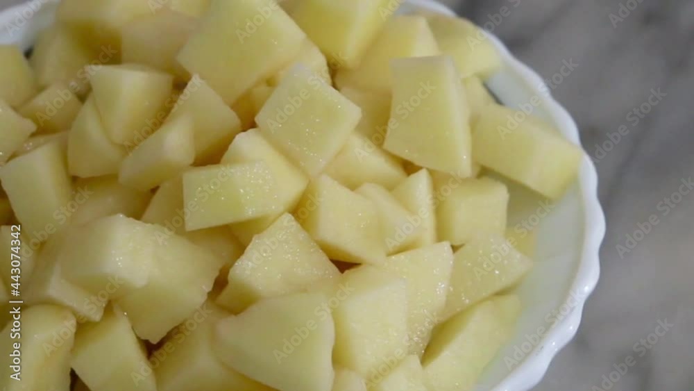 bowl of diced potatoes bowl of diced potatoes