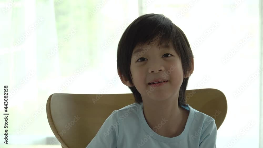 Cute Asian Child Eating Fried Chicken Cute Asian Child Eating Fried Chicken