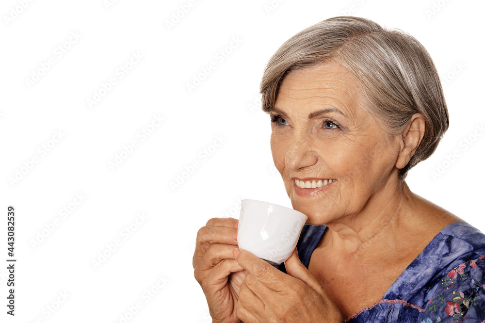 Close up portrait of beautiful senior woman with cup isolated on white background Close up portrait of beautiful senior woman with cup isolated on white background
