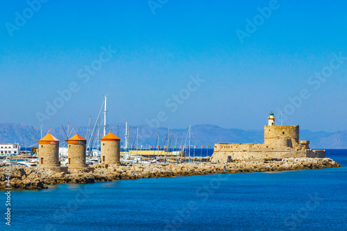 Panorama Fort of St. Nicholas fortress promenade mills Rhodes Greece.