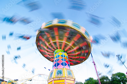 Swing ride in fast speed motion of image at Sydney theme park.