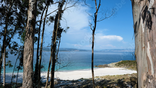 Clear water and white sand beach in Cies Islands photo