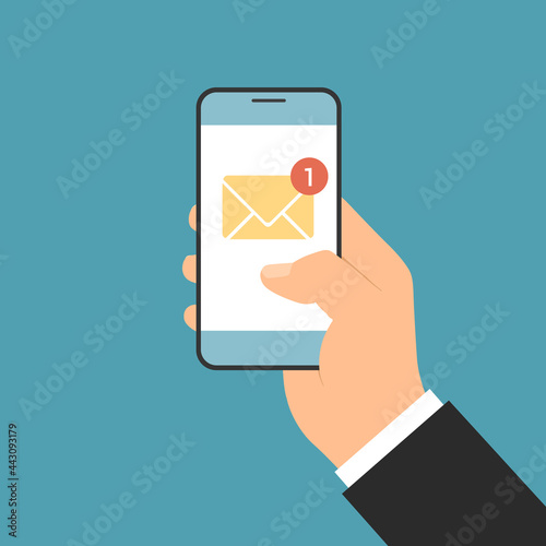 Flat design illustration of a manager's hand holding a smartphone by notifying an incoming email or SMS. Envelope icon with one unread message, vector