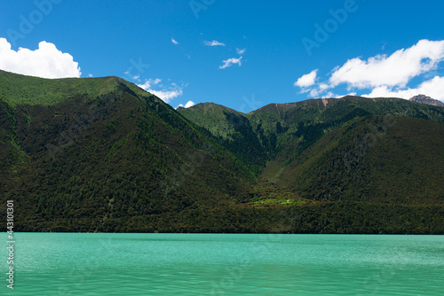 Crystal Clear Glacial Water and Snowy Peaks at Pagsum Lake in Nyingchi, Tibet Autonomous Region photo