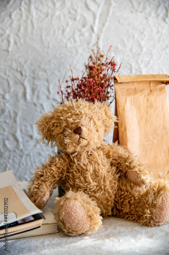 The minimal cafe and coffee shot interior by cute bear doll and brown kraft sachet put on the table.