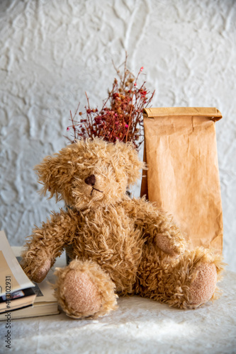 The minimal cafe and coffee shot interior by cute bear doll and brown kraft sachet put on the table.