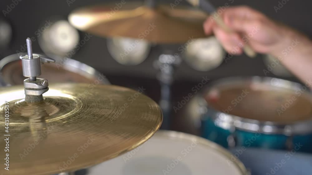 Сlose-up of sticks hitting cymbals. Hobby, music, techniques Сlose-up of sticks hitting cymbals. Hobby, music, techniques