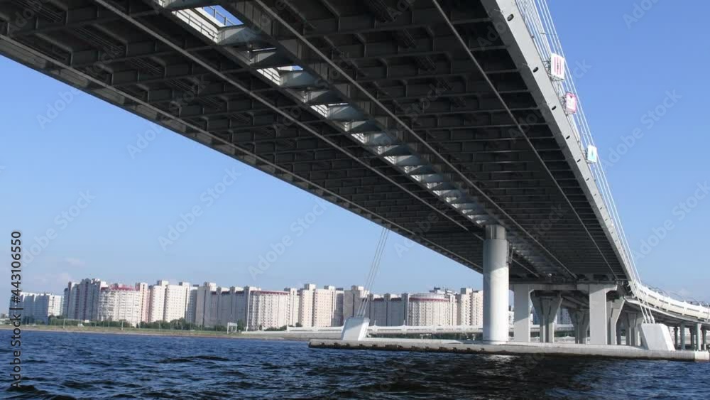 Cable-stayed bridge over the Neva River in St. Petersburg. Floating under the bridges of the city. Cable-stayed bridge over the Neva River in St. Petersburg. Floating under the bridges of the city.