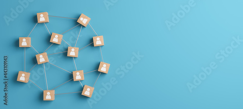 Wooden blocks with people icon on a blue background  3d illustration  human resources and team management concept. 3D rendering.