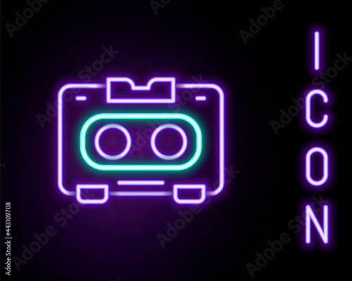 Glowing neon line Retro audio cassette tape icon isolated on black background. Colorful outline concept. Vector