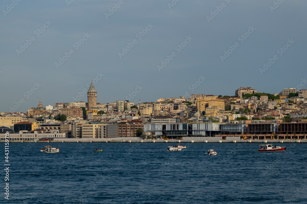 Istanbul Turkey, June 26, 2021: Istanbul cityscape in Turkey with Galata Tower, 14th-century city landmark in the middle. Istanbul Turkey, June 26, 2021: Istanbul cityscape in Turkey with Galata Tower, 14th-century city landmark in the middle.