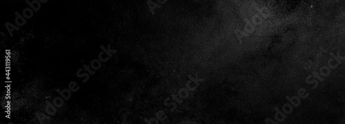 Scary dark wall, low light black concrete cement texture for background © Ronny sefria