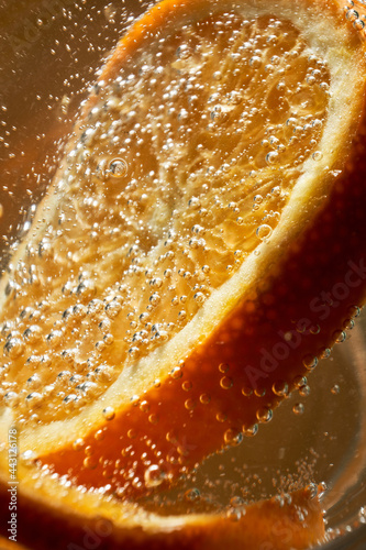 Bubbling gin and tonic with orange