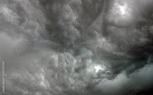 Fototapeta Storm clouds circulate in front of incoming strong thunderstorm squall line,