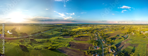 aerial panoramic landscape over the village of Bolshoi Samovets (Voronezh region, center of Russia) on a hot summer evening