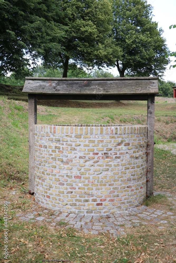 Old stone fountain in Bourtange fortress, Netherlands Old stone fountain in Bourtange fortress, Netherlands