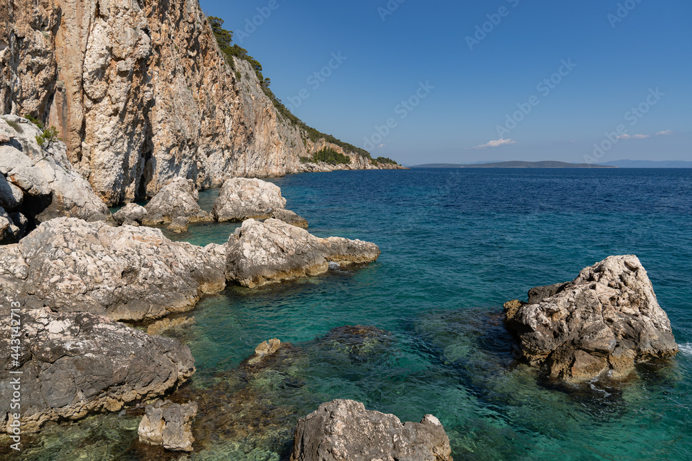 Beautiful view of the rocky shores flowing straight into the Adriatic Sea around the island of Hvar