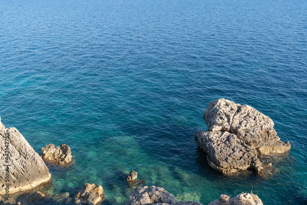 Beautiful view of the rocky shores flowing straight into the Adriatic Sea around the island of Hvar