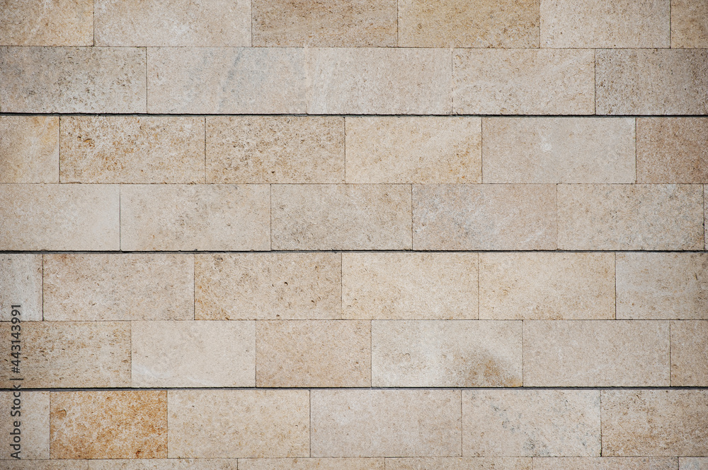 Fototapeta premium Grunge texture beige brick wall. Abstract background or texture.