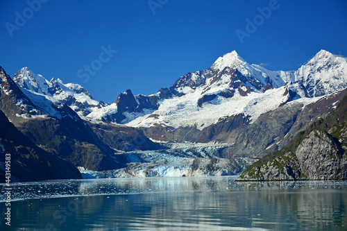 spectacular johns hopkins glacier and surrounding mountain peaks  of the fairweather range on a sunny summer day in glacier bay national park, southeast alaska photo